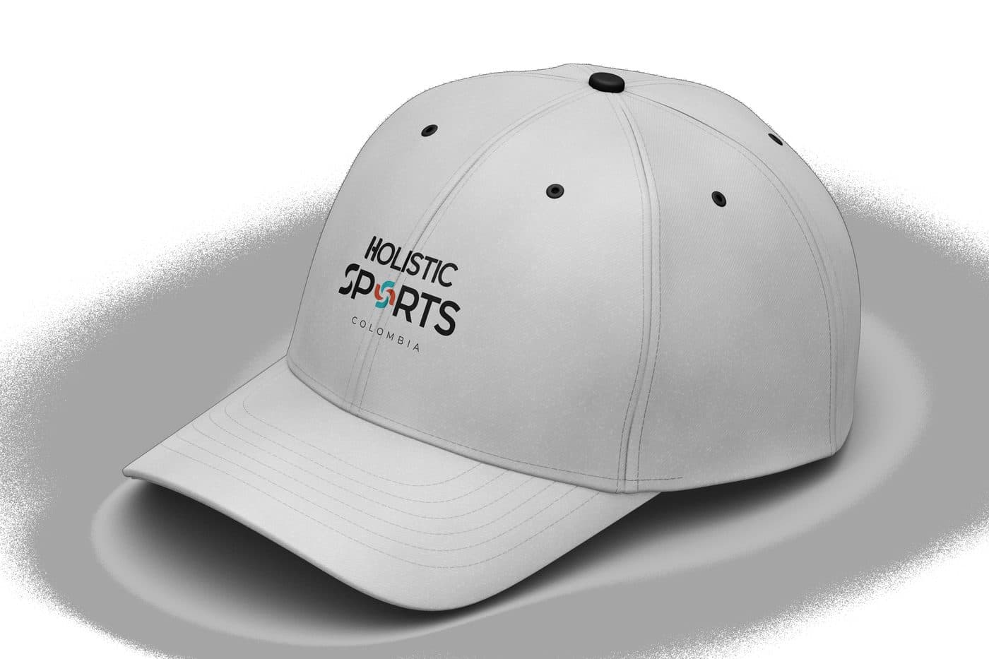 Gorra gris claro con el logo de Holistic Sports Colombia bordado al frente